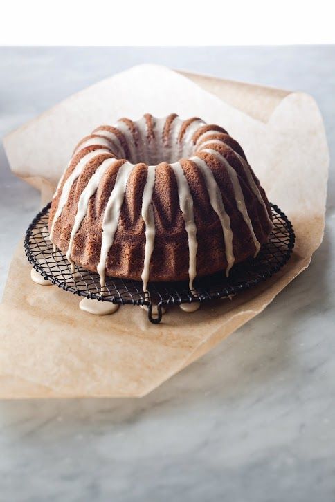 a bundt cake sitting on top of a cooling rack