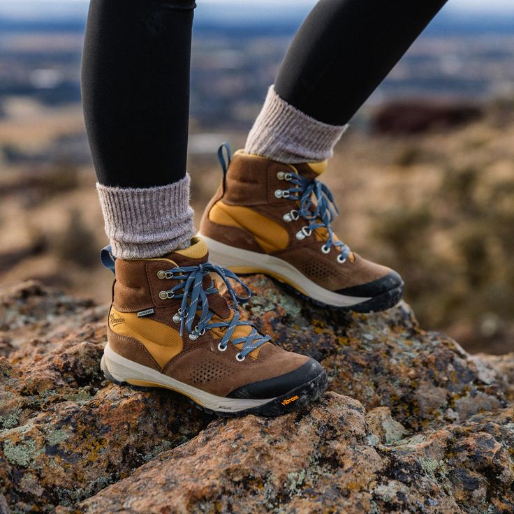 Danner Women's Inquire Mid 5" Waterproof Hiking Boot - Pinecone Brown/Prairie Sand - 64534 On Sale Now! This Item Ships FREE! Off the beaten path, it’s completely capable with trail-ready touches like Danner® Dry waterproofing, our stable Trailguard platform, and a custom, fully-resoleable outsole by Vibram®. On the town, it’s completely comfortable with an athletic-inspired Plyolite® EVA midsole and OrthoLite® footbed. And wherever you take it, our all-new Women’s Precision Fit ensures improved Women Hiking Boots Outfit, Hiking Shoes Woman, Hiking Boot Outfit, Hiking Outfit Aesthetic, Stylish Hiking Boots, Women’s Hiking Boots, Backpacking Boots, Hiking Boots Outfit, Hiking Clothes