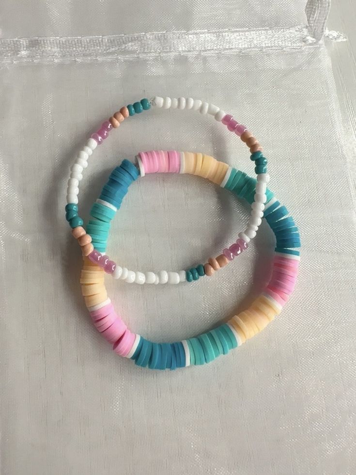 Beaded Bracelets Diy Clay Beads, Bracket Patterns Clay Beads, Beaded Bracket Ideas, Ombre Beaded Bracelet, Clay Bead Bracelet Ideas Aesthetic Purple, Polymer Bead Bracelets Ideas, Colorful Clay Bead Bracelet, Clay Bead Set Ideas, Clay Bead Bracelet Stacks