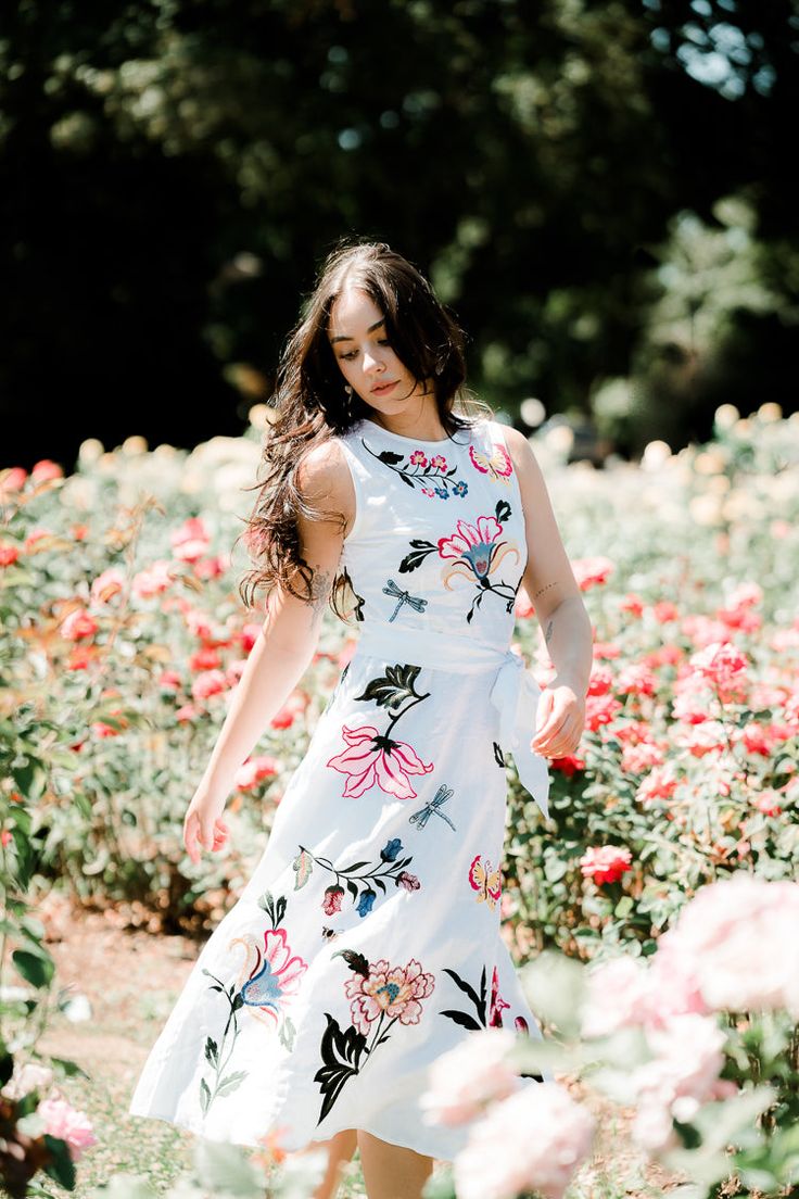 The Gloriosa dress from Fanm Mon is a perfect pick for all year-round easy glam. Cut from 100% linen, this dress is hand embroidered with colorful wildflowers. Classic a-line silhouette. Optional belt tie. Hidden zipper back. We love this dress for a bride for her bridal brunch. Sizing Note: This item runs very small and features zero stretch. Please contact us at hi@shop-confete.com with additional sizing questions as it is subject to a $20 restocking fee when returned. Easy Glam, Colorful Wildflowers, Belt Tie, Embroidered Midi Dress, Bridal Brunch, Belt Tying, Hidden Zipper, Graduation Dress, Hand Embroidered