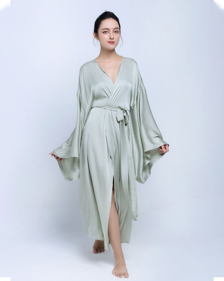 HANDMADE ITEAM - perfect French seam - The model is 5'7 tall and wearing size S. QUALITY KIMONOS: Our kimonos for women are made from Silk, comfortable and lightweight. Gentle cycle mode when you use machine wash with cold and in washing bag or hand-wash with cold water is the best, and hang flat to dry - Please do not squeeze or dry with dryer. THREE SIZE: Using only the best materials in the market, our charmeuse robe or long robe kimono for women have three size are small size, medium size and large size , fits most women as a dressing gown. DESIGN: Long style kimono robe for women, kimono sleeves, ankle length, tie waist and inside ties. PLEASE NOTE THAT ACTUAL COLORS MAY VARY DUE TO YOUR COMPUTER RESOLUTION AND MONITOR COLOR RETRICTIONS. VERSATILITY: The design perfect for daily wear Robe For Women, Silk Kimono Robe, Silk Robe, Bridesmaid Robes, Mint Color, Womens Robes, Long Style, Silk Kimono, Kimono Sleeve