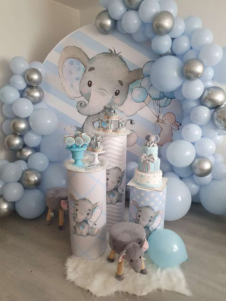 a baby elephant themed party with balloons and decorations