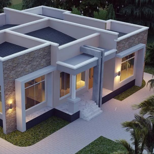 an aerial view of a modern house with lights on the front and side windows at night