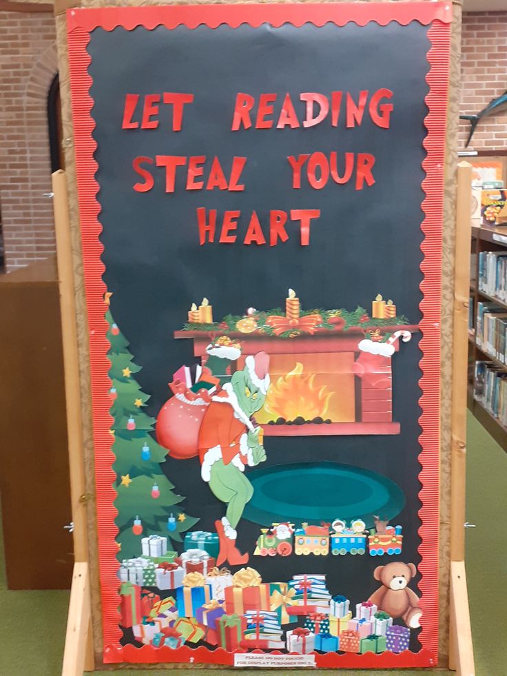 a sign that says let reading steal your heart on the side of a book shelf