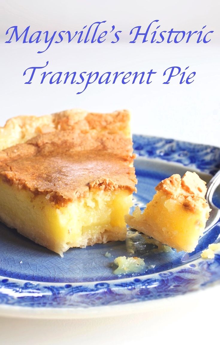 a piece of pie sitting on top of a blue plate