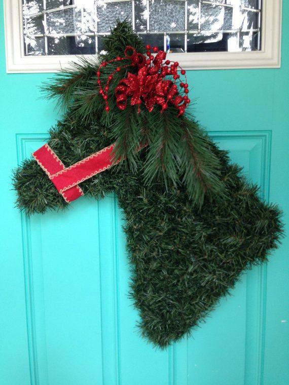 a christmas stocking hanging on the front door