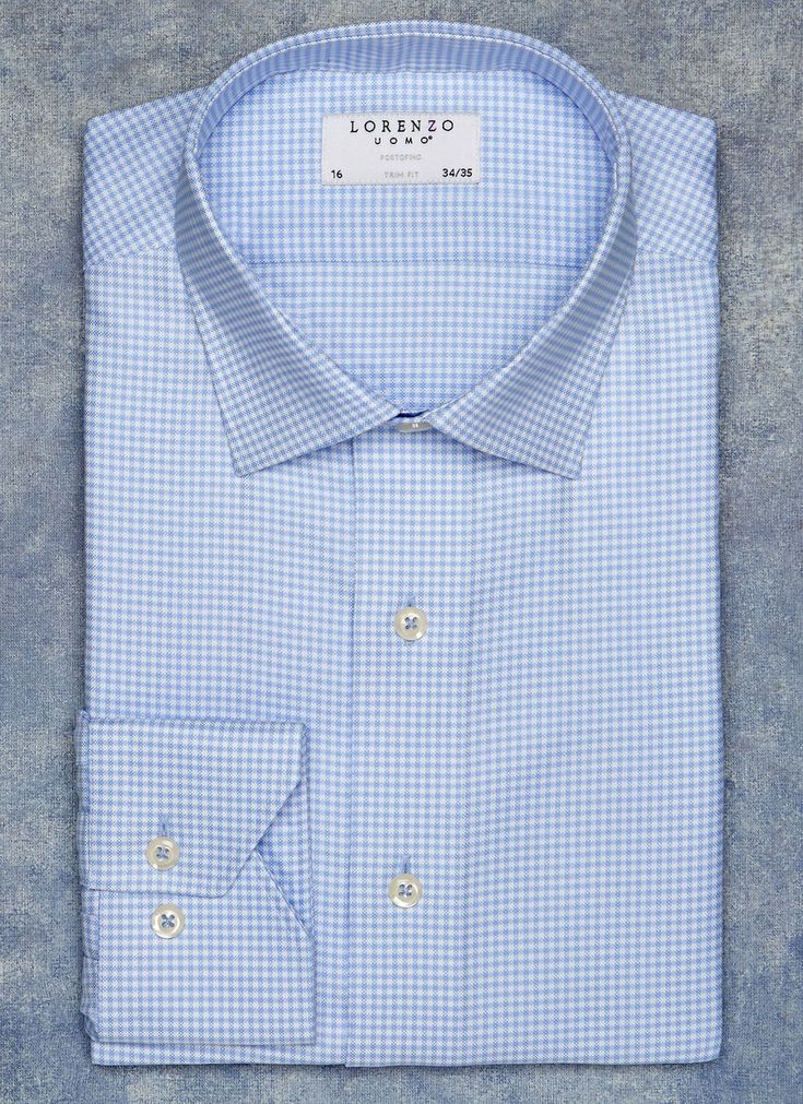 An updated classic gingham, the Alexander in Blue Gingham is crafted is crafted from the smoothest, high density luxury fabric. While the no wrinkle, non-iron fabric has a robust feel, it also has breathability and drape. The Alexander is the trimmest of all our fits, calibrated to accentuate a lean, athletic body type. • Trimmest Fit • 100% Super 80s 2-ply Cotton• Easy Care, Non Iron• Spread Collar• Mitered Barrel Cuff • Imported • Item #LUW9F24 Athletic Body Types, Athletic Body Type, Perfect White Shirt, Athletic Body, Wool Tie, Luxury Fabric, Gingham Shirt, Blue Gingham, Feel It