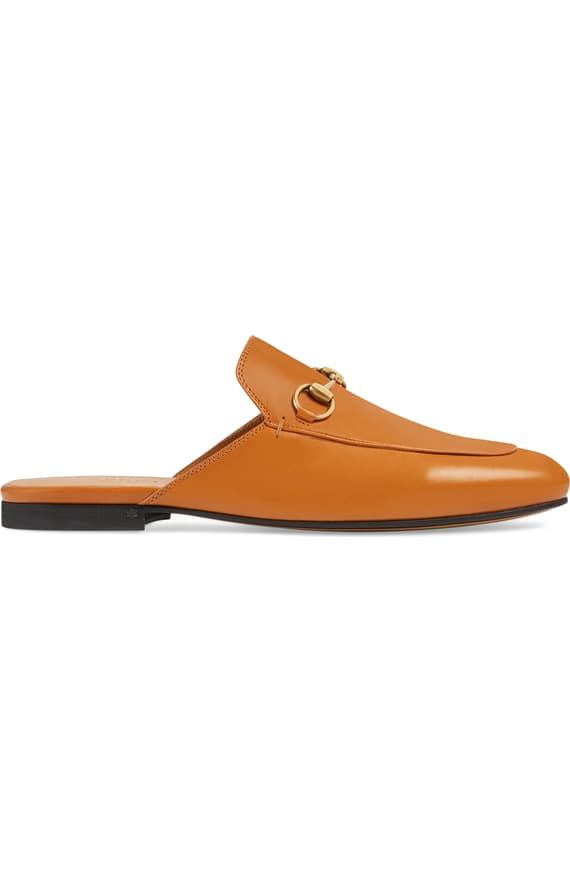 Classic Calf Leather Mules For Work, Gucci Slip-on Mules, Gucci Luxury Formal Mules, Luxury Gucci Mules For Formal Occasions, Gucci Classic Mules With Leather Sole, Luxury Gucci Slip-on Mules, Classic Gucci Mules With Leather Sole, Classic Gucci Formal Mules, Formal Gucci Mules With Leather Sole