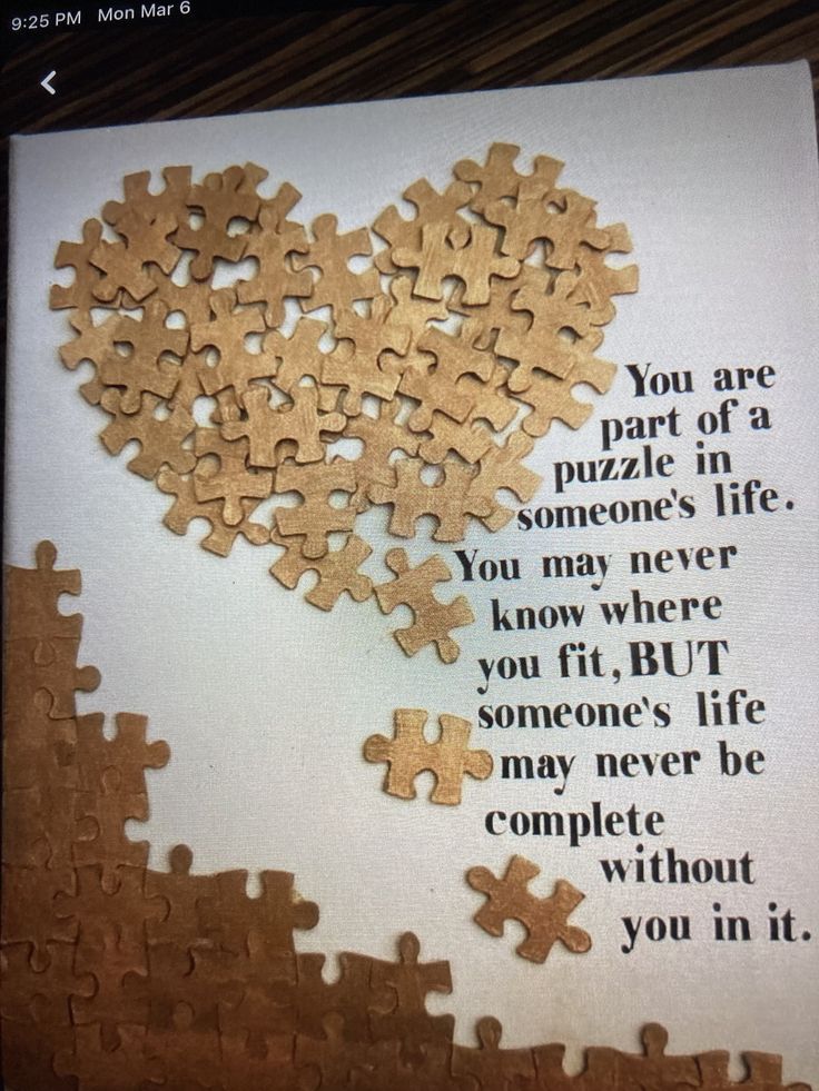 a piece of puzzle sitting on top of a card with the words you are part of a someone's life