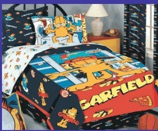 a bed with garfield the cat comforter and sheets