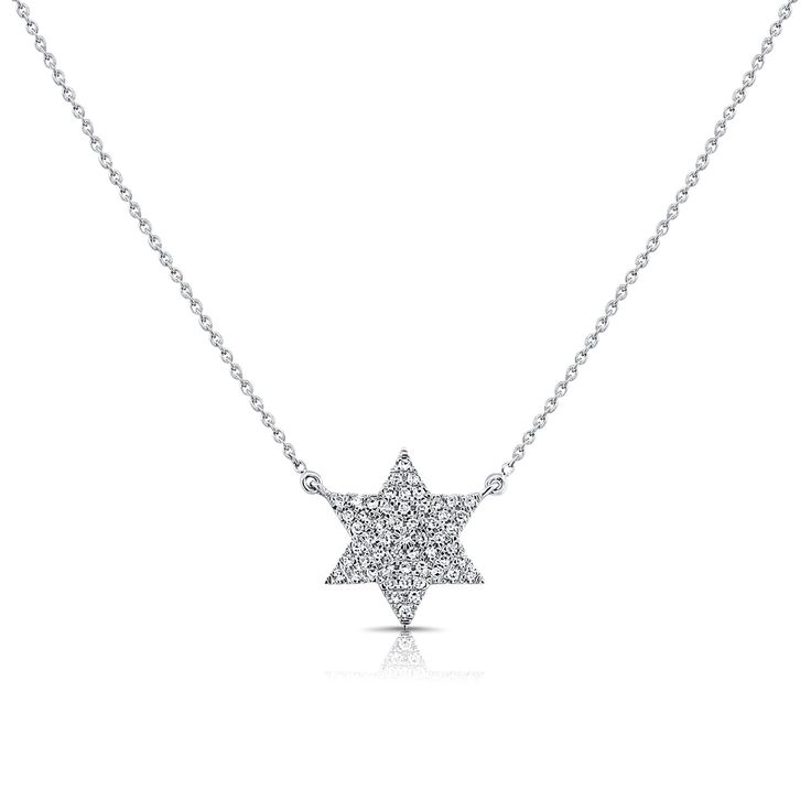 Elevate your elegance with this exquisite 14K Gold Star of David Necklace. Meticulously crafted from radiant 14K gold, this necklace features a stunning Star of David pendant, symbolizing faith and unity. The pendant is delicately embellished with sparkling diamonds totaling 0.19 carats, adding a touch of brilliance and sophistication. The elegant chain completes the piece, ensuring a refined and timeless look that’s perfect for any occasion. Whether worn as a daily emblem of personal significan Silver Diamond Star Of David Necklace, Silver Diamond Necklace In Star Of David Shape, Star-shaped Diamond White Necklace With Single Cut Diamonds, Formal White Gold Star Of David Necklace, Dazzling Star-shaped White Gold Necklace, Dazzling Star Shaped White Gold Necklace, Dazzling White Gold Star Necklace, Star-shaped Diamond Necklace With Single Cut Diamonds, Star Shaped Diamond Necklace With Single Cut Diamonds