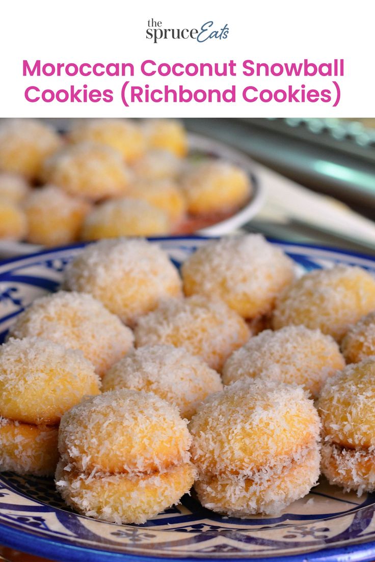 a blue and white plate topped with sugar covered cookies