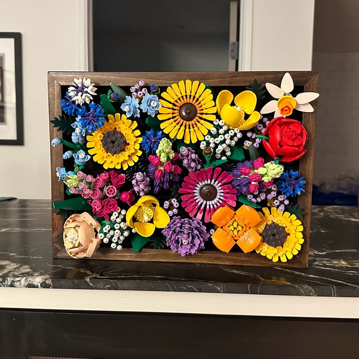 Lego flower shadow box frame with dark walnut stain Lego Wall Decorations, Lego Succulent Display Ideas, Lego Flower Wall Display, Lego Botanical Display, Lego Flower Ideas, How To Display Lego Flowers, Lego Flower Display Ideas, Lego Succulent Display, Lego Botanical Collection Display