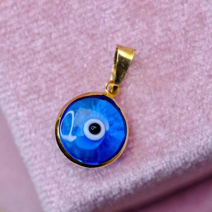 Evil Eye Pendant / Charm Metal: 14K Real Gold  Color: Yellow and Blue Height: 1.8cm Width: 1cm Blue Gold Plated Jewelry With Charms, Blue Gold-plated Jewelry With Charms, Blue Charms Pendant Jewelry, Blue 14k Gold Necklace With Charms, Blue Pendant Jewelry With Charms, Blue Charms Jewelry Gift, Blue Round Hallmarked Jewelry, Gold Plated Evil Eye Round Pendant Jewelry, Blue Round Gemstone Jewelry