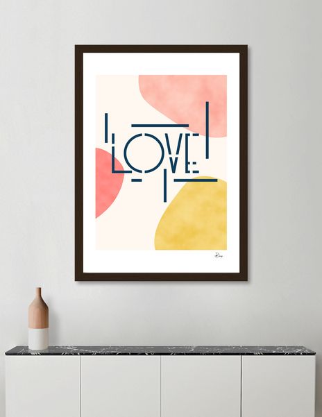 a framed art print with the word love on it