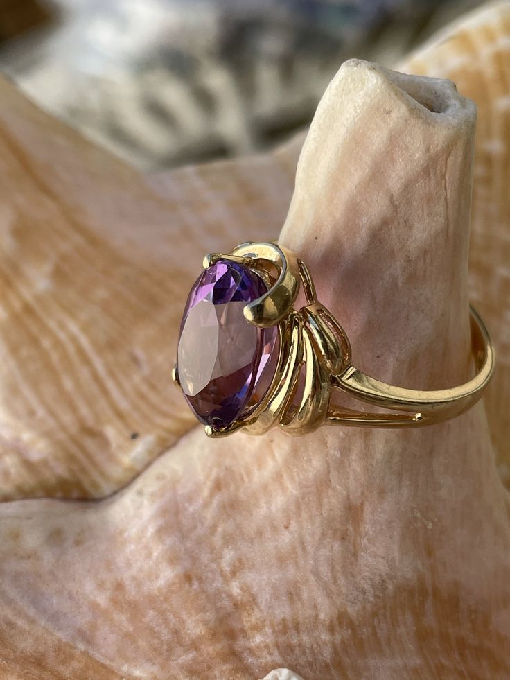 Vintage 14k yellow gold ring engagement ring promise ring with 8 ct faceted amethyst cabochon size 8 3/4 US circa 1980's. Such a beautiful ring. Hallmarked 14k and the amethyst is in great condition such a lovely ring that can make a lady very happy. Luxury Vintage Amethyst Ring, Luxury Vintage Gold Amethyst Ring, Luxury Timeless Amethyst Ring With Polished Finish, Elegant Pear-shaped Yellow Gold Birthstone Ring, Purple Ruby Ring For Formal Occasions, Elegant Oval Solitaire Gemstone, Classic Pear-shaped Topaz Ring For Formal Occasions, Classic Formal Pear-shaped Topaz Ring, Formal 14k Gold Amethyst Ring