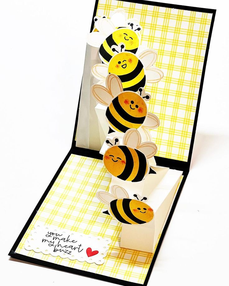 a card with some cute little bees on it's front and back sides,