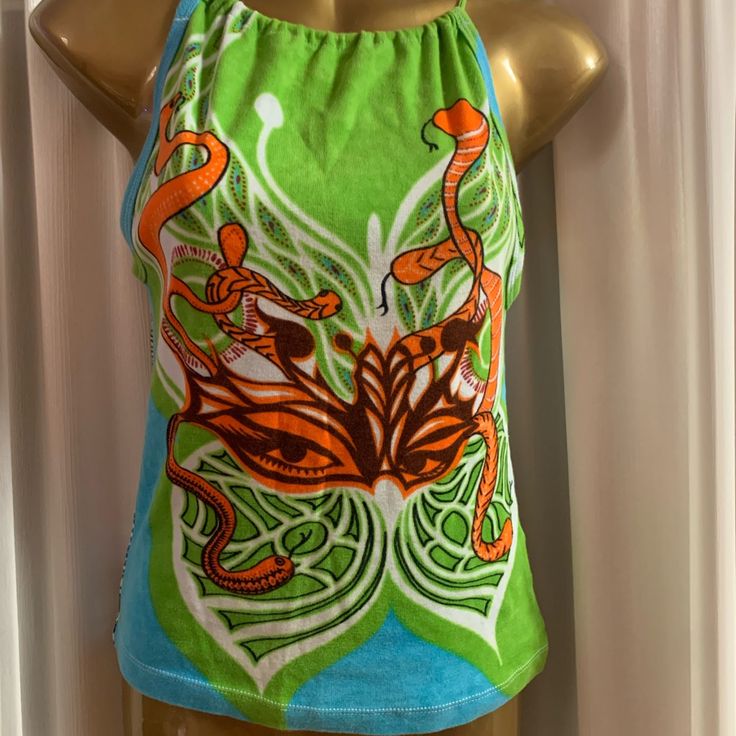 Beautiful Sleeveless Top With Adjustable Neckline. New. Sold As Is. I’ll Consider All Reasonable Offers. Casual Multicolor Stretch Halter Top, Casual Multicolor Halter Top For Festival, Casual Orange Sleeveless Halter Top, Blue Casual Tank Top For Festival, Casual Blue Tank Top For Festivals, Green Halter Neck Tank Top For Vacation, Green Sleeveless Halter Top For Beach, Summer Orange Tank Top, Vibrant Cotton Tops For Beach