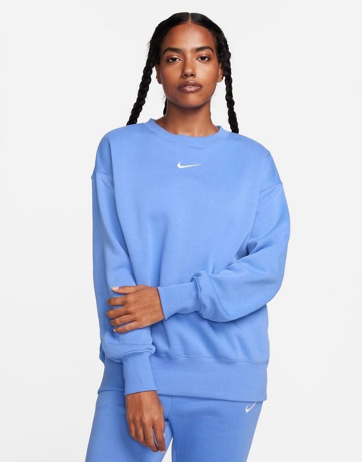 Sweatshirt by Nike Act casual Crew neck Drop shoulders Logo embroidery Relaxed fit Nike Phoenix Fleece, Nike Sportswear Women, Spandex Shirts, Nike Sweatshirt, Oversized Crewneck, Nike Sweatshirts, Workout Sweatshirt, Pullover Designs, Women Hoodies Sweatshirts