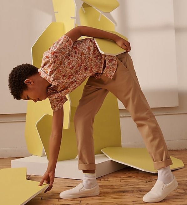 Our world-famous chinos (aka khakis) are a kid's favorites for a reason—several, actually. We make this pair in comfy cotton with a hint of stretch (so he can play all day). New this season, our boys' relaxed fit was designed with room to move, and relaxed through the hip and thigh with a full leg. By buying cotton products from J.Crew, you're supporting our investment in Better Cotton's mission to help cotton communities survive and thrive while protecting and restoring the environment. This pr Relaxed Fit Cotton Chinos For Spring, Spring Cotton Stretch Chinos, Spring Stretch Cotton Chinos, Relaxed Fit Chino Cotton Twill Chinos For Spring, Relaxed Fit Chinos In Chino Cotton Twill For Spring, Relaxed Fit Chinos For Spring, Spring Relaxed Fit Chinos In Cotton Twill, Play All Day, For A Reason