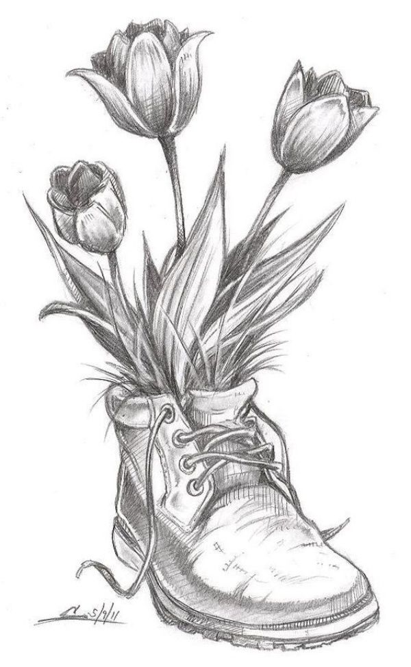 a drawing of a boot with tulips in it and a shoe on the ground