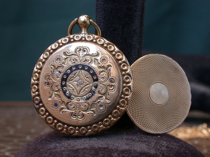 "WE SELL THIS NICE VICTORIAN PHOTO LOCKET MEDAL PENDANT MADE IN 9K GOLD DECORATED WITH ENAMEL AND 1 LITTLE GENUINE DIAMOND ,IN GOOD CONDITION ,HAS SOME SIGNS OF WEAR COMMENSURATE WITH AGE AND USE , PLEASE SEE PICTURES, MAYBE NEEDS SOME CLEANNING, PLEASE SEE PICTURES, OPEN AND CLOSE WELL,SOME ENAMEL IS MISSING, PLEASE SEE PICTURES, the measures are 1\" diameter X 1 1/2\" total long WEIGHT 5.5gr As is a vintage antique item , it's unique , for that if you like to wear it , don't miss the opportuni Victorian Photos, Gold Wedding Cake, Black Onyx Stone, Photo Locket, Chatelaine, Crystal Wedding, Gold Decor, Onyx Stone, Rose Cut Diamond