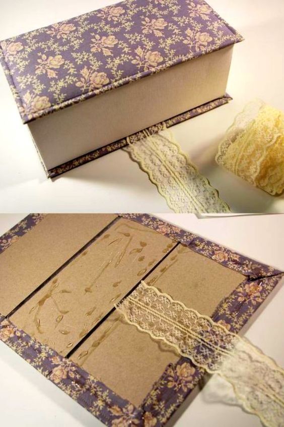 the inside of an open book with lace on it