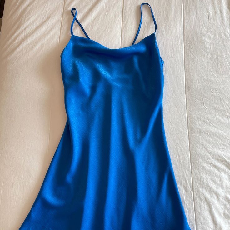 This Slip Dress Has A Beautiful Blue Color And Is Perfect For Many Different Occasions. Feel Free To Offer Different Price If Interested! Condition: Never Worn! Color: Blue Size: Xs Fitted Blue Slip Dress For Summer, Fitted Sleeveless Blue Slip Dress, Blue Midi-length Slip Dress For Party, Blue Midi Length Slip Dress For Party, Blue Fitted Midi Slip Dress, Blue Sleeveless Casual Slip Dress, Blue Casual Slip Dress With Spaghetti Straps, Casual Blue Slip Dress With Spaghetti Straps, Casual Blue Sleeveless Slip Dress