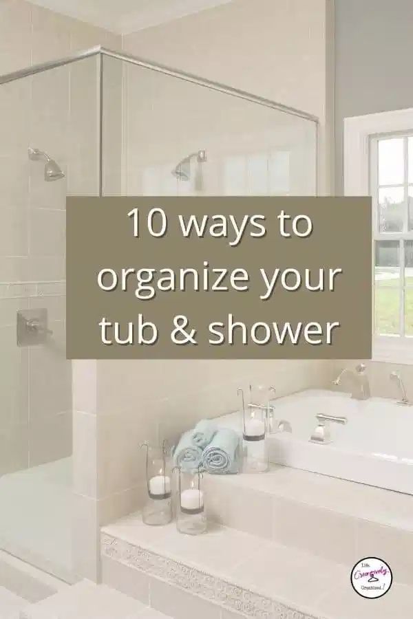 a bath tub sitting under a window next to a sink and shower in a bathroom