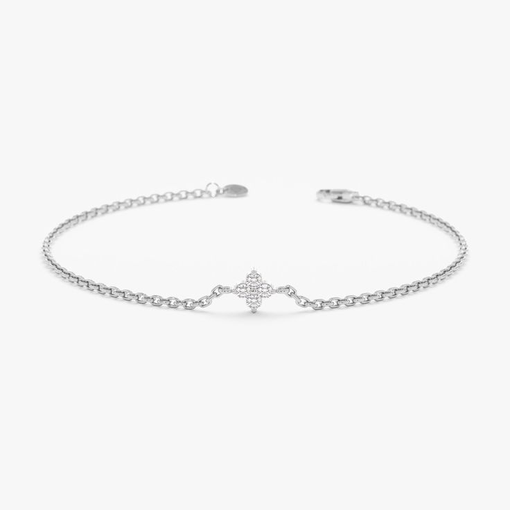 Amy Embrace a touch of timeless elegance and subtle sparkle with this Minimalist Natural Diamond Clover Bracelet. This captivating bracelet is crafted from high-quality 14k gold (available in yellow, rose, or white gold) and features a dainty four-leaf clover charm. Four sparkling diamond bezels adorn the clover, symbolizing luck and prosperity. The intricate design creates a touch of shimmer, making this bracelet a perfect everyday accessory or a meaningful addition to a layered look. - Handmad Tarnish Resistant White Gold Diamond Bracelet In Sterling Silver, Tarnish Resistant White Gold Diamond Bracelet, Tarnish-resistant White Gold Sterling Silver Diamond Bracelet, Elegant Round Diamond Bracelet, Tarnish Resistant, Elegant Round Tarnish Resistant Diamond Bracelet, Elegant Round Tarnish-resistant Diamond Bracelet, Elegant Sterling Silver Gold Bracelet, Tarnish Resistant, White Gold Diamond Bracelet, Tarnish Resistant, Dainty White Gold Chain Bracelet, Tarnish Resistant