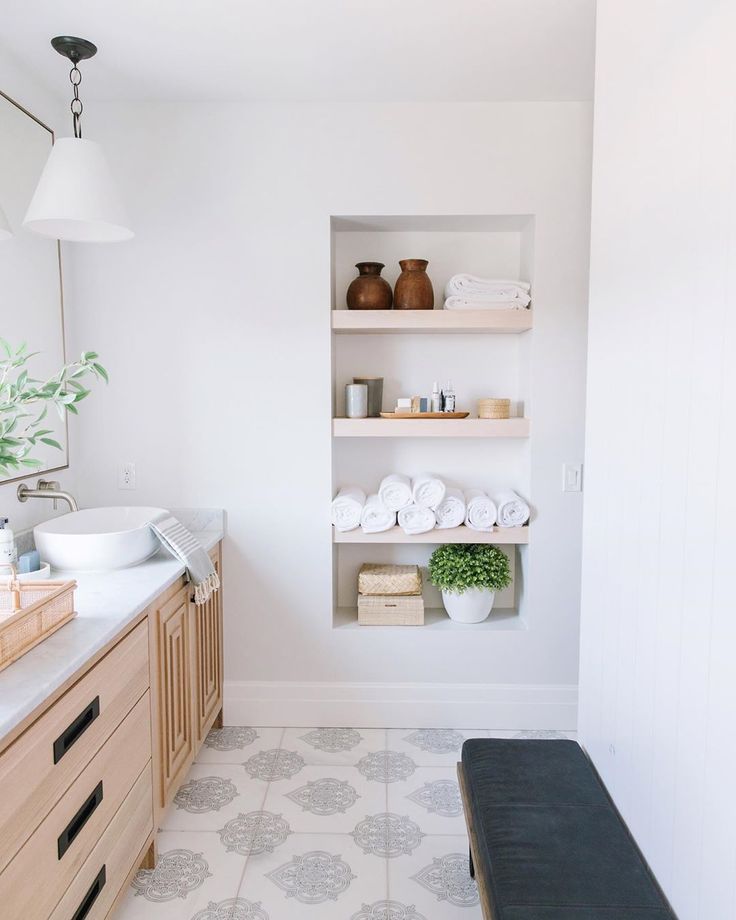 the bathroom is clean and ready to be used as a spa room or office space