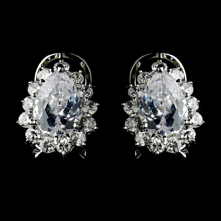 Rhinestone Stud Bridal Earrings e5397 Add an extra touch of bling to your wedding or formal attire with these sparkling earrings. These stunning rhinestone bridal earrings will dazzle on your special day. Perfect for the bride, bridesmaids or Mother of the bride or groom! Size- 1/2" long. Color: Silver/Clear. Style: e5397. For pierced Ears. Also available with navy blue accents as e5397bl . Need several pair of earrings for your bridal party? You can buy in bulk and save! Please allow 1 week for Formal Earrings, Dazzling Earrings, Crystal Chandelier Earrings, Rhinestone Bridal, Rhinestone Studs, Dress Gift, Blue Accents, Pierced Ears, Clear Rhinestones