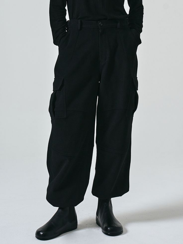 Editor's notesThis is a cargo parachute pant that has various cargo details throughout. You can style it for casual and trendy look.- Field pocket on the thigh - Flap patch pocket on the back - Adjuster on the waistband - Tuck detail on the knee - Logo engraved ox horn button Measurements(in.)48/50/52- Length: 42.01 in. / 42.52 in. / 42.91 in.- Waist: 15.51 in. / 16.50 in. / 17.52 in.- Hip: 23.00 in. / 24.02 in. / 25.00 in.- Thigh: 15.00 in. / 15.51 in. / 15.98 in.- Rise: 15.87 in. / 16.14 Techwear Black Pants With Flap Pockets, Urban Style Winter Cargo Jeans With Side Pockets, Techwear Pants With Patch Pockets For Work, Urban Cargo Jeans With Side Pockets For Winter, Techwear Cargo Jeans With Pockets For Work, Baggy Military Cargo Pants With Patch Pockets, Military Style Baggy Parachute Pants With Patch Pockets, Military Style Cargo Pants With Multiple Pockets For Streetwear, Techwear Cargo Jeans For Work With Multiple Pockets