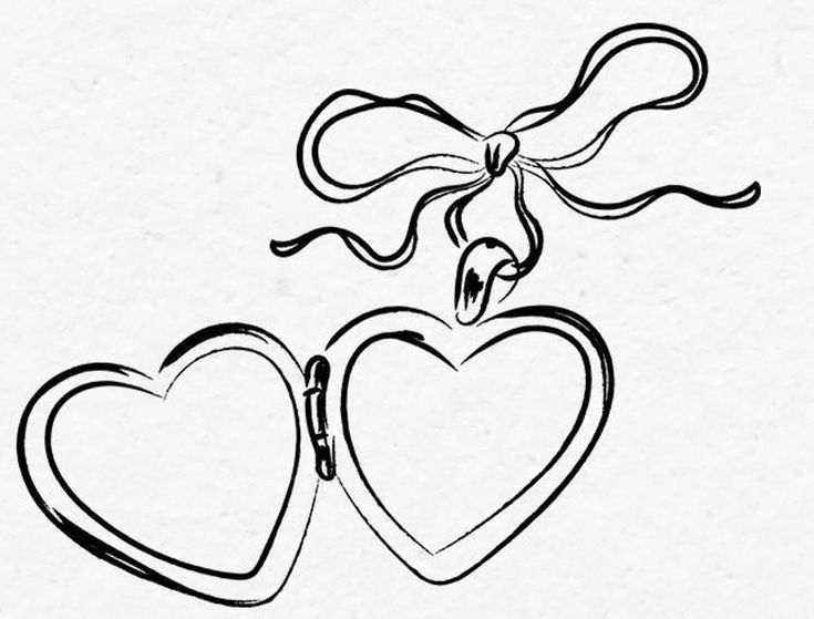 two heart shaped objects with a ribbon tied around them