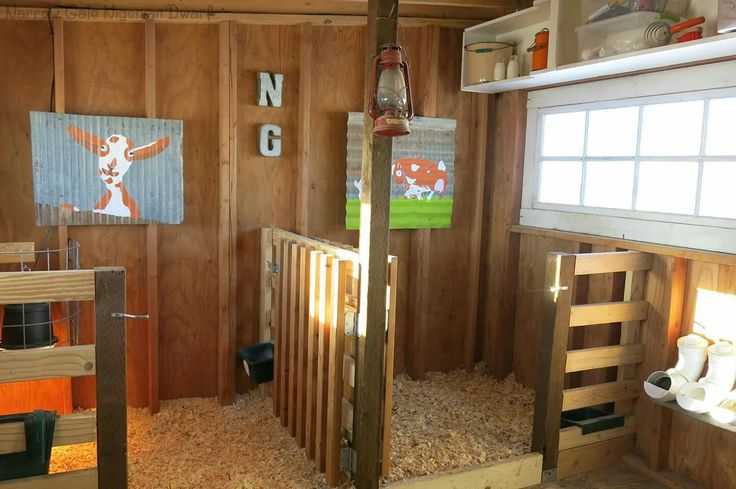 a room with wooden walls and wood flooring