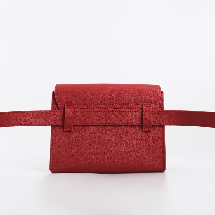 Created with the same compulsive obsession for quality and organizing genius, this belt bag can be a fun companion. Materials: genuine leather & premium waterproof polyester lining Wear it 5-ways – like a belt bag, a sling bag, a crossbody, a clutch, or a shoulder bag. Dimension : Width 7" Height 5" Depth 2.5" Look inside to find a thoughtful zip pocket, four card slots, and a key clip. Versatile Belt Bag For On-the-go, Everyday Belt Pouch Bag, Travel Pouch Bag With Removable Belt, Everyday Pouch Bags With Belt, Belted Pouch Bag For Everyday Use, Everyday Belted Pouch Bag, Travel Pouch Shoulder Bag With Belt, Rectangular Belt Bag With Belt Loops For Travel, Belted Pouch Shoulder Bag