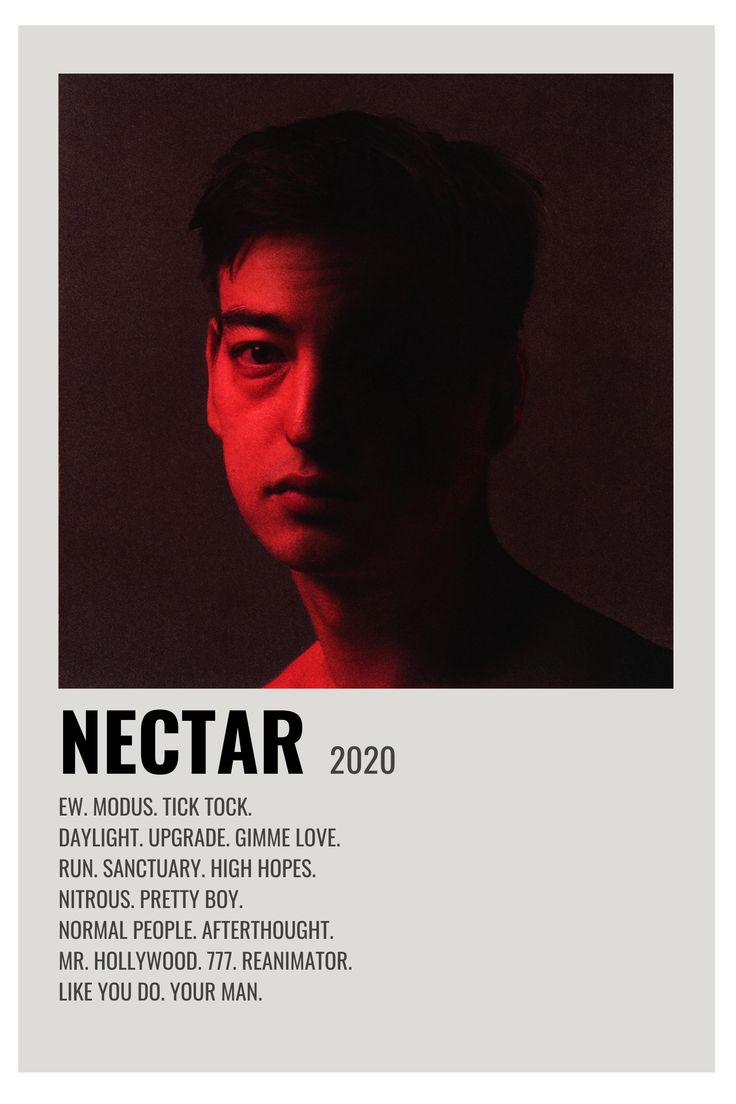 a man is staring at the camera in front of a red and black poster that says nectar