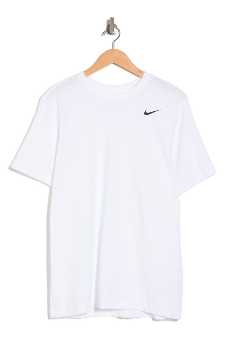 Breathable, sweat-wicking fabric keeps you comfortable in any activity in a T-shirt made with soft cotton and a fit that lets you move. 28 1/2" length (size Medium) Dri-FIT moisture-wicking technology 57% cotton, 43% polyester Machine wash, line dry Imported Tshirt Nike, Plain White T Shirt, Nike Shirt, Nike T, Nike Tshirt, Nike Shirts, Nike Outfits, Wish List, New Wardrobe