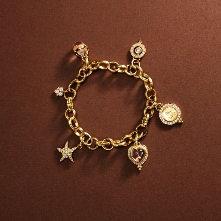 Temple St. Clair Charm Bracelet is composed of circular links. Whether worn as is or with cherished charms using its clasp openings, this bracelet is the ultimate jewelry collection staple. 18K Yellow Gold Length: 7.5" Charms are sold separately. Classic Gold Charm Bracelet With Jubilee Detail, Classic Gold-tone Charm Bracelet With Chain, Gold-plated Charm Bracelet With Jubilee Detail, Temple St Clair, Elegant Gold-tone Charm Bracelet With Chain, Temple St Clair Jewelry, Deer Bracelet, Circle Monogram, Blue Moonstone