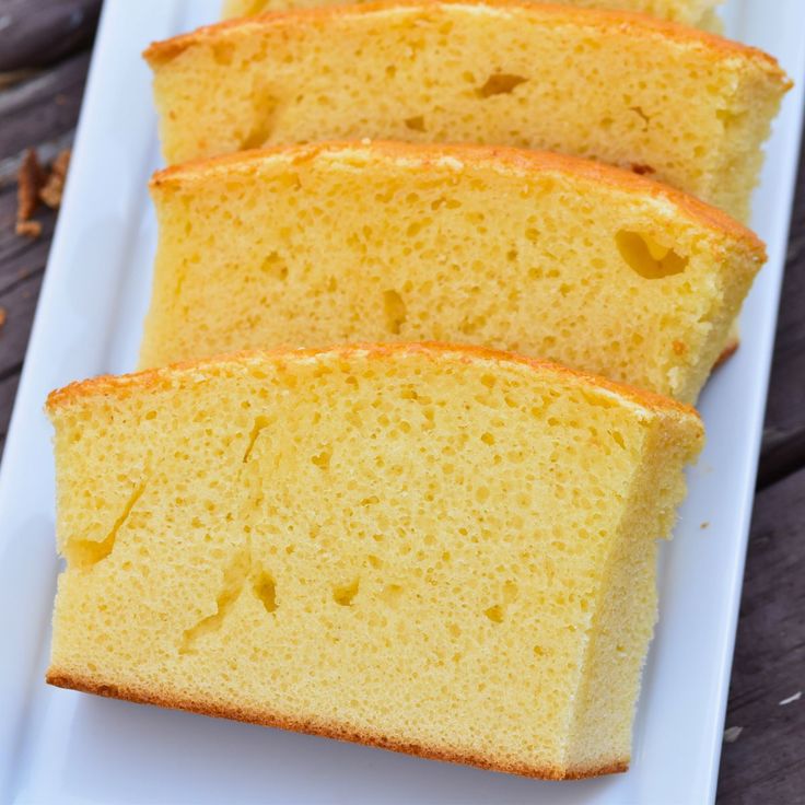 three slices of pound cake on a white plate