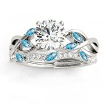 a diamond and blue topazte wedding ring set