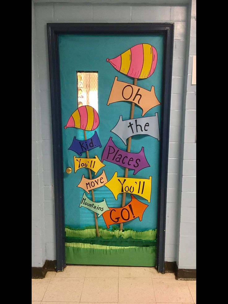 a classroom door decorated with colorful paper cutouts that say, oh the places you'll go