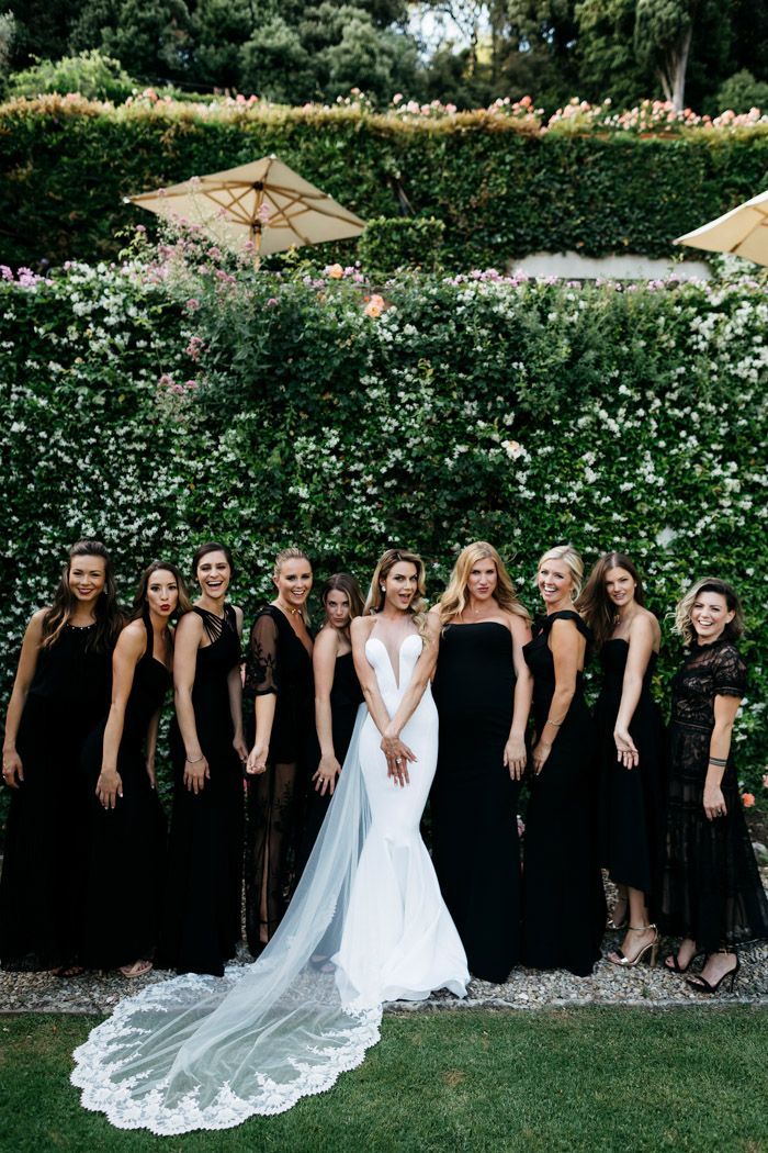 a group of women standing next to each other