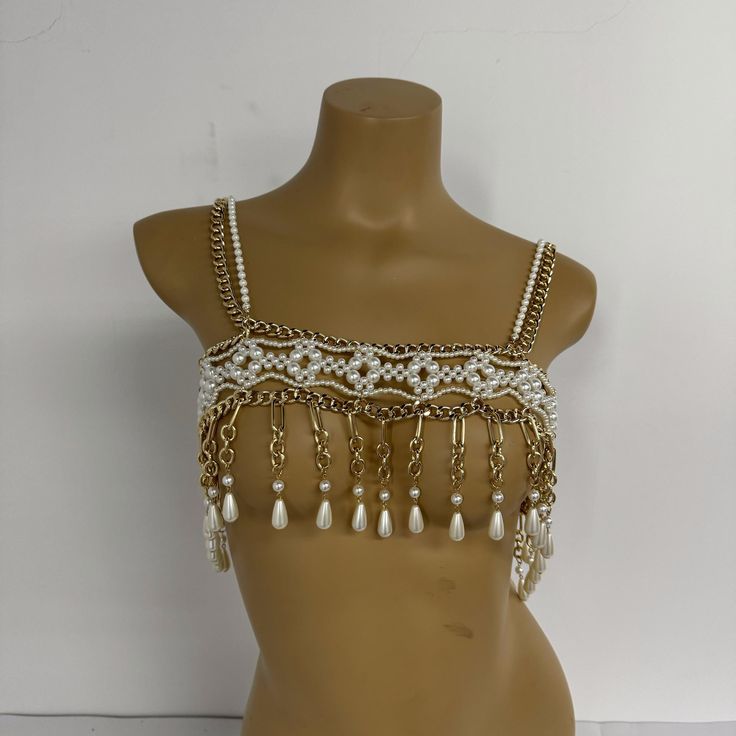 artificial pearl body chain necklace for wedding dresses and evening dresses | bridal accessories | statement jewelry Size: Adjustable (special sizes require customization) Please contact customer service ❤ "Pearl Body Chain: The Elegant Companion Close to Your Body" 1：The pearl body chain is a brilliant embellishment on your skin. 2：Each pearl shines with a gentle luster, linked together to outline the charming lines. 3：It is the fashionable spirit, dancing on your collarbone and waist, adding Body Chain Wedding Dress, Stomach Jewelry Body Chains, Waist Chains Body Jewelry, Body Harness Jewelry, Pearl Body Chain, Body Chain Necklace, Necklace For Wedding, Body Necklace Chain, For Wedding Dresses