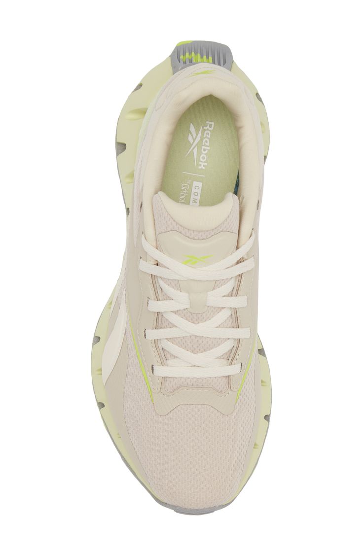 Step into style with this mesh running shoe that is fitted with lightweight FuelFoam cushioning for comfortable support and set on a chunky zigzag midsole. Synthetic upper and lining/rubber sole Imported Reebok Zig Dynamica, Shoe Women, Running Shoe, Womens Running Shoes, Nordstrom Rack, Rubber Sole, Running Shoes, Nordstrom, Mesh