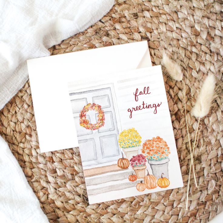 a card that says fall greetings on it next to some flowers and pumpkins