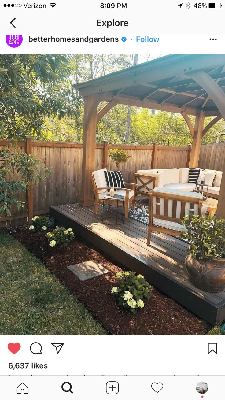 an image of a backyard with wooden decking