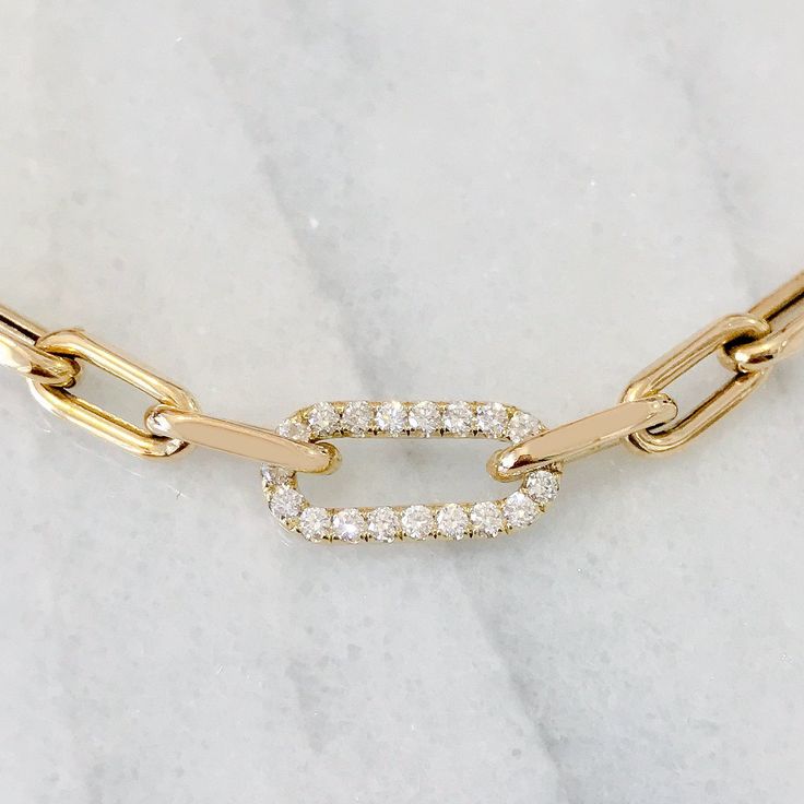 "NOTE: This specific listing is for merchandise that we have available in stock & ready to ship. If you are interested in purchasing this item with more length choices kindly click the following link for your convenience: https://www.etsy.com/listing/737621128/thick-oval-diamond-link-14k-solid-gold?ga_search_query=oval%2Blink&ref=shop_items_search_18&pro=1&frs=1 This Italian handcrafted chain link bracelet is completely composed of 14K solid gold and is uniquely made with a semi- Diamond Chain Link Bracelet For Gift, Oval Link Diamond Bracelet As Gift, Diamond Bracelet With Oval Link Chain For Gift, Gift Diamond Link Bracelet With Adjustable Chain, Gift Chain Link Diamond Bracelet With Gold Chain, Gift Diamond Bracelet With Gold Chain, Gift Gold Chain Link Diamond Bracelet, Oval Gold Diamond Bracelet As Gift, Oval Gold Diamond Bracelet For Gift