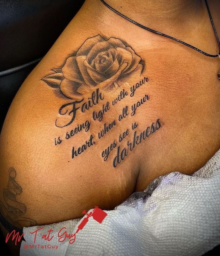 a woman with a rose tattoo on her chest saying faith is seeing right with you