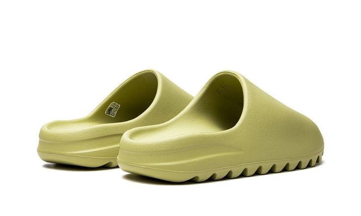 The adidas Yeezy Slide “Resin 2022” is the September 2022 release of Kanye West’s slip-on shoe in a neutral earth tone colorway.  The Yeezy Slide has been released in several “Resin” colorways over the past few years to meet the demand and popularity of the look.  The September 2022 version is darker in hue than the 2021 release, and more brownish-tan than the original green look from 2020.  As lightweight and effortlessly versatile as ever, the “Resin” is constructed from soft EVA foam for all- 2022 Shoes, Adidas Yeezy Slide, Yeezy Slides, Exclusive Sneakers, Nike Dunk High, September 2022, Adidas Campus, Nike Shox, Air Jordan 3